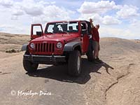 Carl and his rental jeep, Hell's Revenge, near Moab, UT