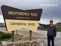 Carl and sign at Independence Pass, CO