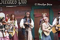 The wenches and Captain Jack Sparrow sing a song about beer, Colorado Renaissance Festival, Larkspur, CO