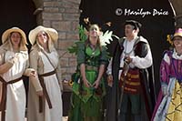 Actors gather at the entrance to sing a farewell song, Colorado Renaissance Festival, Larkspur, CO