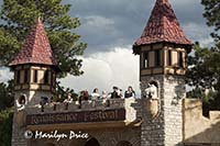 Actors gather at the entrance to sing a farewell song, Colorado Renaissance Festival, Larkspur, CO