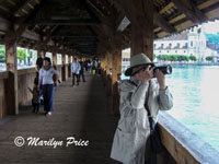 Marilyn shoots on the Chapel Bridge, Lucerne, Switzerland