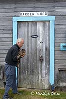 Terry and cat at garden shed door, Sequim, WA