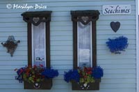 Windows and flowerboxes on a houseboat, Fisherman's Wharf, Victoria, BC