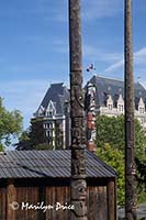 Totem poles and The Empress Hotel, Victoria, BC