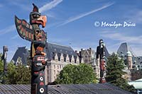 Totem poles and The Empress Hotel, Victoria, BC