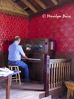 Carl plays piano in the saloon, Wyoming Territorial Prison and Old West Park, Laramie, WY