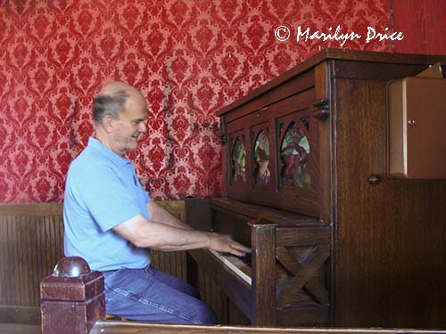 Carl plays piano in the saloon, Wyoming Territorial Prison and Old West Park, Laramie, WY