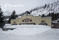 Yellowstone Trading Post almost buried in snow, Cooke City, MT